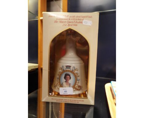 A Bell's Scotch Whisky commemorative bell decanter by Wade for the 60th birthday of Queen Elizabeth II, 1986, boxed and seale