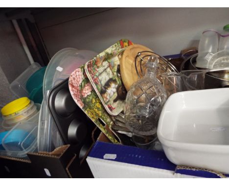 Two boxes of kitchen ware to include sauce pans, plastic storage containers, cutlery, trays, non-stick dishes etc