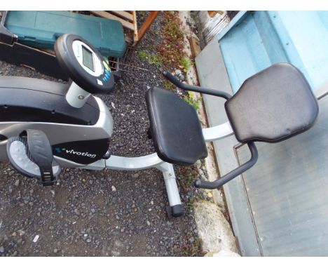 A Vivotion seated exercise bike with digital screen