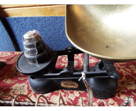 A set of brass and cast iron scales