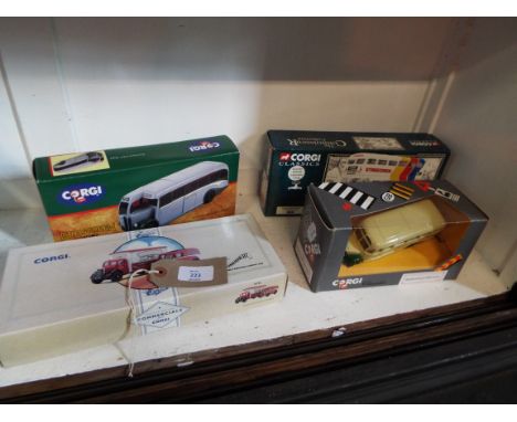 Four boxed Corgi die cast model vehicles comprising of an AEC Regal in grey-green livery No. 97180, a RM 560 stagecoach AEC R