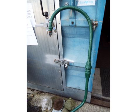 A green painted cast metal lamp post top section