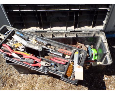 A tool box together with assorted tools