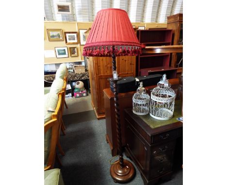 A barley twist lamp stand and shade