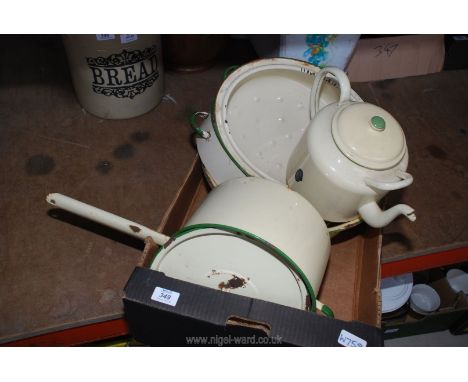 A box of cream enamel including; teapot, roasting tin, large saucepan, etc.