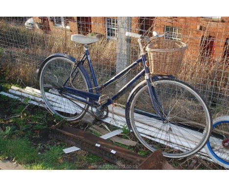 A Marlborough Woodstock ladies vintage bicycle with basket. 