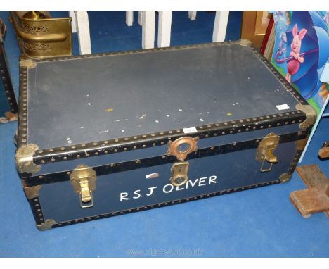 Black travel trunk with initials R.S.J Oliver to the front, 35 1/2'' x 20'' x 13'' high.