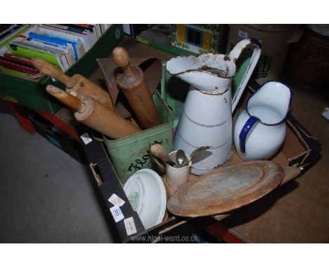 A box of wooden rolling pins, bread boards, enamel jugs, etc.