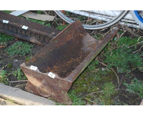 Part of a cast iron pig trough.  