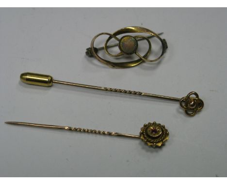 Charles Horner; An Openwork Bar Brooch, with cabochon highlight, within swirl design border; together with a stick pin, of ci