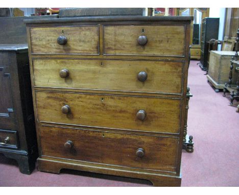 A XIX Century Mahogany Chest of Drawers, with a low back, two small drawers, three long drawers, on bracket feet.