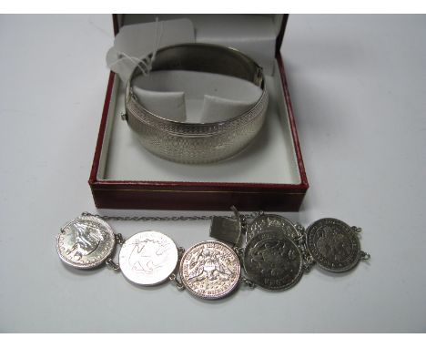 A Wide Hallmarked Silver Bangle, with engine turned detail, to snap clasp fastener, a decorative coin style panel bracelet, w
