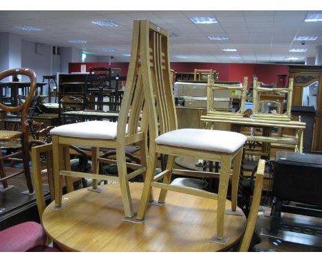 A Set of Four Light Oak Dining Chairs, in the Macintosh manner.