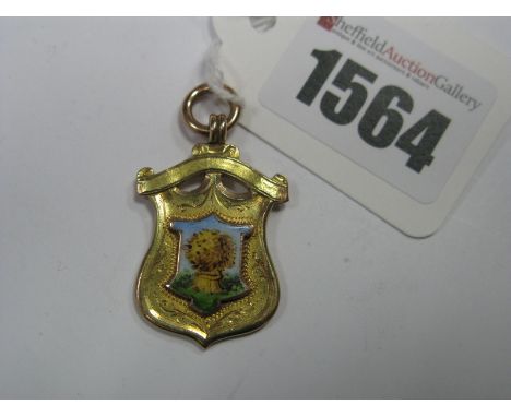 A 9ct Gold Medallion Style Pendant, with inset enamel detail, depicting wheat sheaf, engraving to reverse "E. Luton &amp; Son
