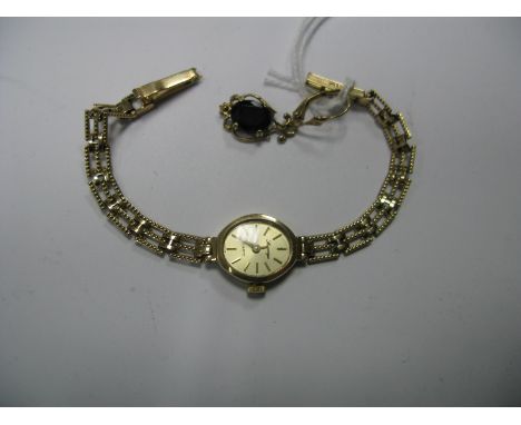 Sovereign; A 9ct Gold Cased Ladies Quartz Wristwatch, to integral 9ct gold gate style bracelet, including single drop earring