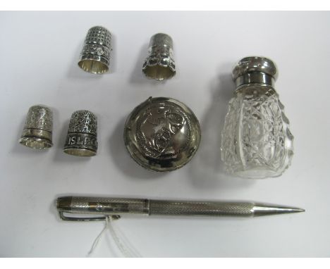 A Hallmarked Silver "Isle of Man" Souvenir Thimble, three further thimbles, a Yard O Led engine turned pencil, a hallmarked s
