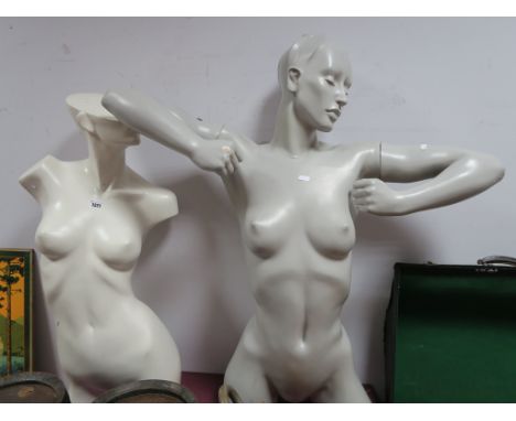A Three Quarter Length Female Shop Mannequin, with detachable arms, height 101cm and a further three quarter mannequin . (2)