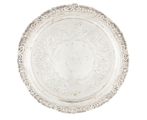 A Scottish George III salver J W Howden &amp; Co, Edinburgh 1817, of circular outline with cast floral border, the flat with 