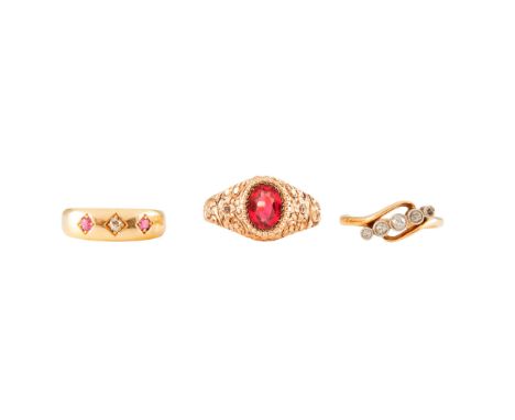 Three gem set rings to include a ruby-doublet set ring in a caste floral border to a plain shank, unmarked; a five stone diam