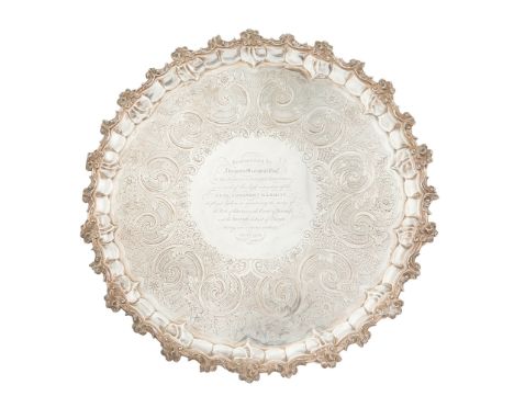 An impressive presentation tray Fenton Brothers Ltd, Sheffield 1907, of circular form, with a cast floral border, the engrave