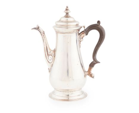 An Edwardian coffee pot Skinner &amp; Co, London 1908, of plain Georgian baluster form, scroll spout, the hinged lid of domed