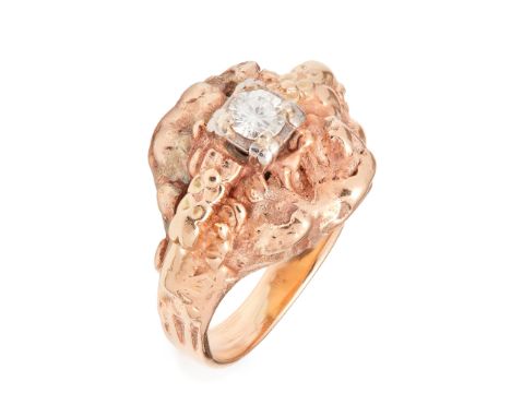 A diamond set ring cast as a gold nugget, claw set with a round brilliant-cut diamond, to a plain shank stamped HJ10K(Ring si