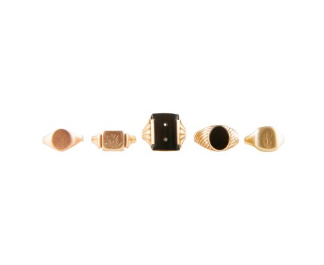 A collection of signet rings to include three 9ct gold signet rings with various initials engraved to centre; a 9ct gold onyx
