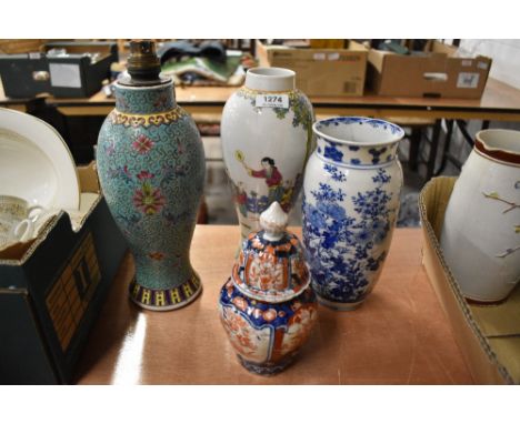 Four oriental vases including Imari urn AF, Famille Rose lamp base, transfer printed blue and white vase and an enamel decora