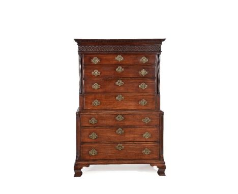 A George III mahogany chest on chest, circa 1770, the dentil cornice and blind fretwork frieze, above four long drawers flank