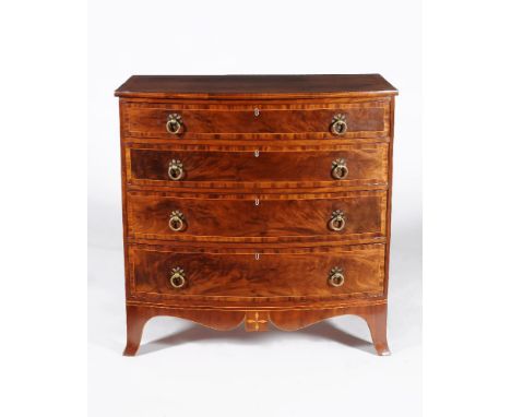 ϒA George III mahogany and crossbanded bowfront chest of drawers, Channel Islands, circa 1810, inlaid with stringing througho