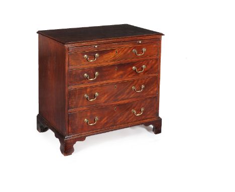 A George III mahogany chest of drawers, circa 1780, the rectangular top with moulded edge, above a brushing slide and four lo