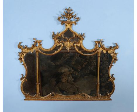 A carved giltwood wall mirror, in George III style, late 19th/early 20th century, in the manner of Thomas Chippendale, the sh