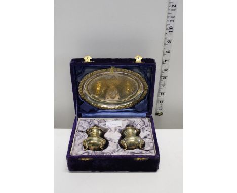 A vintage boxed brass condiment set 