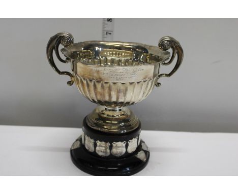 A hallmarked silver trophy by Walker &amp; Hall. Hallmarked for Sheffield 1918. Weight of silver trophy 366 grams (without ba