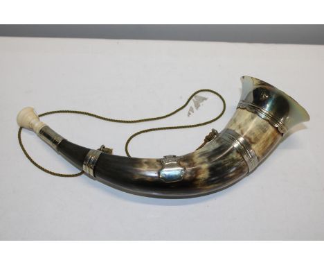 A good quality vintage horn with metal fittings 