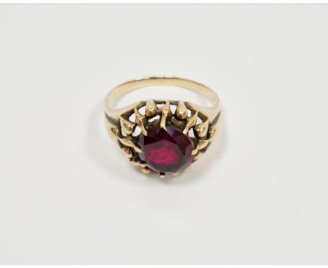 Synthetic ruby yellow metal ring, round mixed cut synthetic ruby claw set, tapered shoulders, ring size U½, valued as 9ct gol