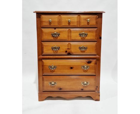 American Broyhill Furniture stained pine chest of five long drawers, the top drawer with three brass knob handles and the rem