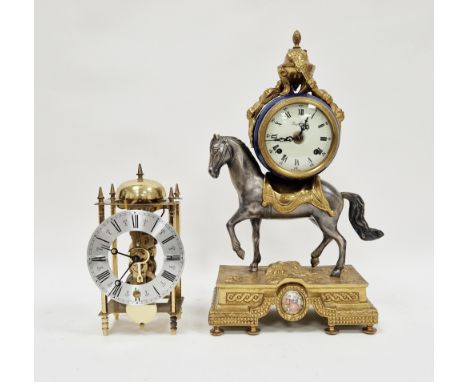 20th century French style 8-day mantel clock, the metal case in the form of a horse surmounted by a circular clock with blue 
