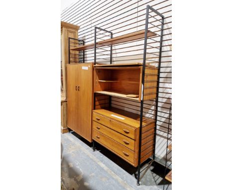 Mid-century Ladderax by Staples teak and metal modular wall cabinet&nbsp;comprising three metal side supports holding a two-d