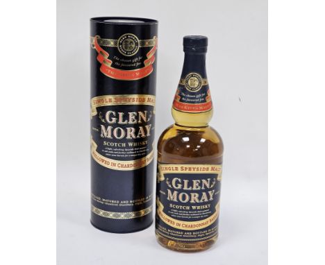 Bottle of Glen Moray single Speyside malt scotch whisky mellowed in Chardonnay barrels distilled, matured and bottled in Scot