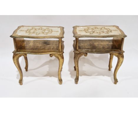 Pair of Italian Florentine-style bedside tables&nbsp;with a gilt and cream finish, each comprising an open shelf and raised o