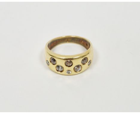 18K gold and diamond ring, the tapering band set with eight old cut variously sized diamonds in rubover setting (size N)&nbsp