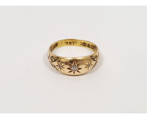18ct gold and diamond dress ring, the three old cut diamonds within star settings (size P)Condition Reportapprox weight is 3.