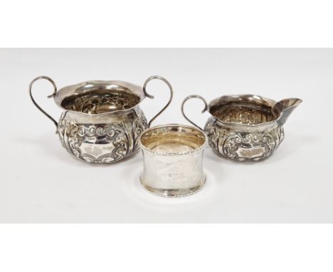 Victorian silver matching cream jug and sugar bowl, Birmingham 1887 George Unite, with repousse floral and foliate decoration