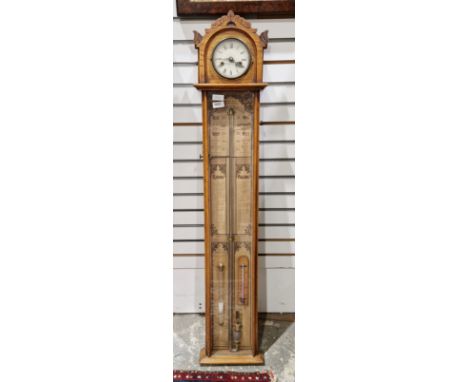 Victorian oak cased ' Admiral Fitzroy's barometer ' with clock (movement replaced with battery operated), the case housing ba