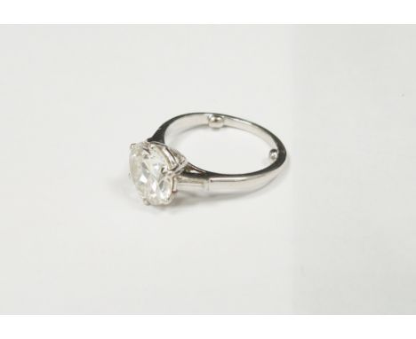 Diamond solitaire white metal ring, the round brilliant cut diamond measuring approx. 9.33 x 9.31 x 5.40mm, diamond weight ap