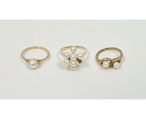 18k yellow gold ring set with a cluster of pearls (one pearl missing), ring size O, 3.5 grams together with 9k yellow gold ri