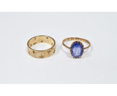 Gold-coloured metal and blue stone dress ring set oval claw set blue stone and a 9ct gold and white stone band set with small