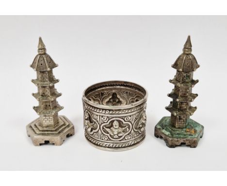 Pair of Chinese white metal pepperettes in the form of pagodas stamped ' On Hing ' to base, 7cm high together with an Indian 