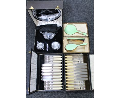 An Art Deco brush set, cased chrome tea service and two cases of fish cutlery 